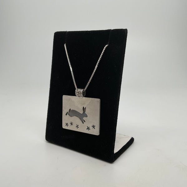 Rabbit Leaping Over the Flowers Pendant